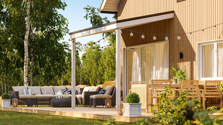 Photorealistic 3D visualization of a wooden house terrace with outdoor seating area in summer, surrounded by trees, created by Nordic Render.