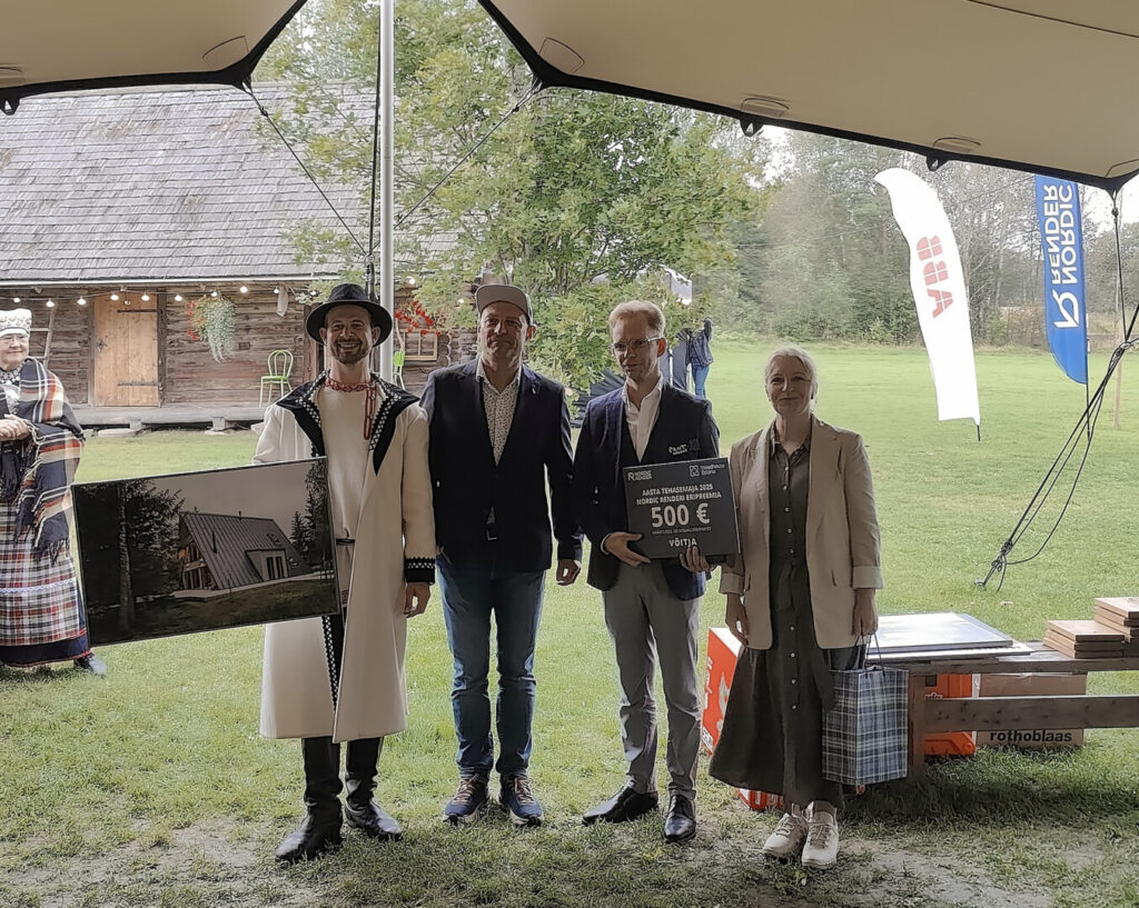 Nordic Render team presenting the special award to OÜ Avrame at the Prefab House of the Year 2025, celebrating innovative A-frame house design.